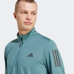 VESTE DEMI-ZIP OWN THE RUN HOMME