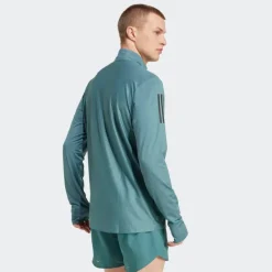 VESTE DEMI-ZIP OWN THE RUN HOMME