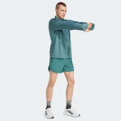VESTE DEMI-ZIP OWN THE RUN HOMME