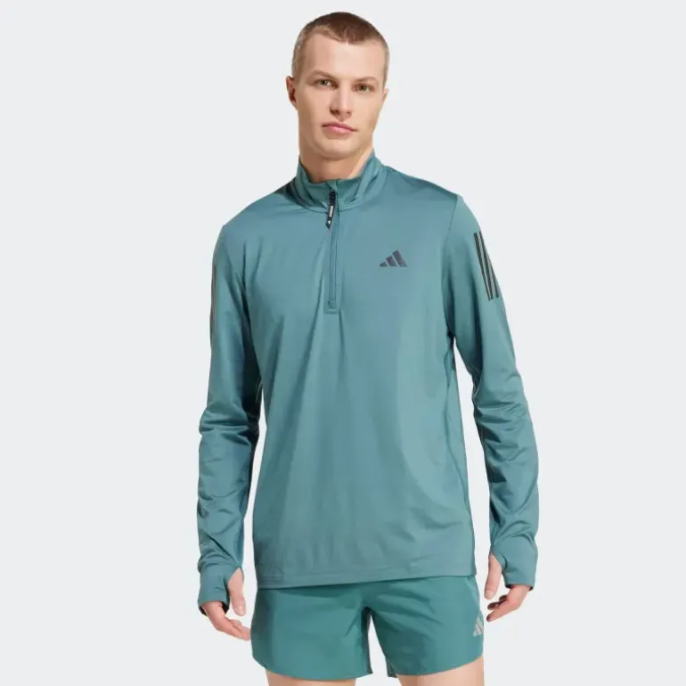 VESTE DEMI-ZIP OWN THE RUN HOMME