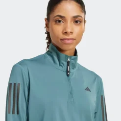 VESTE DEMI-ZIP OWN THE RUN FEMME